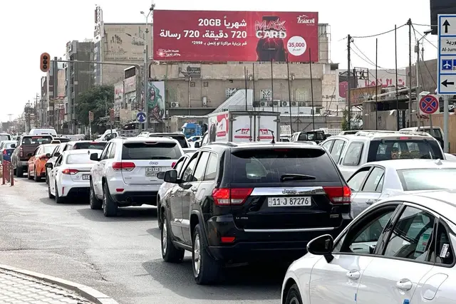 Billboard at Al Jamhoriya Street, Basra