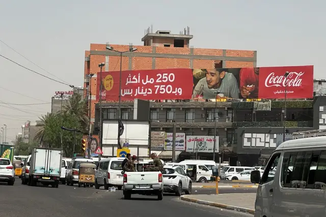 Coca-Cola billboard at Palestine Street - Al Mawal Intersection, Baghdad