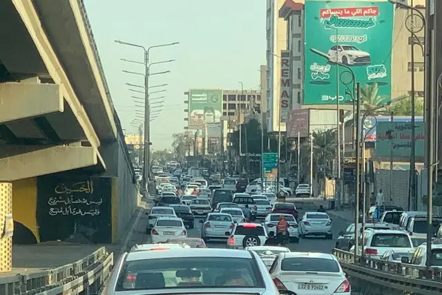 Billboard at Mjsr Thawrat Al Ishreen, Najaf