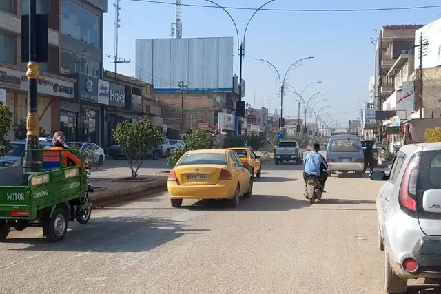 Billboard at Al Shawi Street, Babil