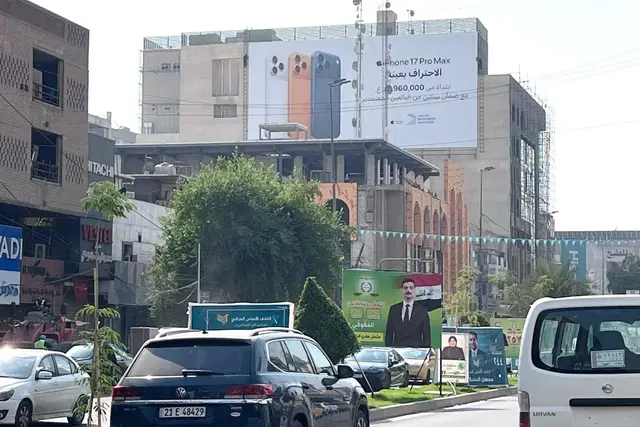 Apple/iPhone billboard at Karada Kharij, Baghdad