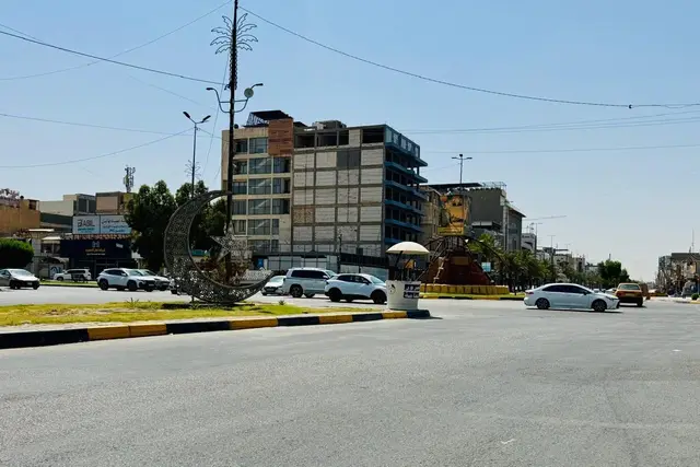 Billboard at Snatir Street, Karbala