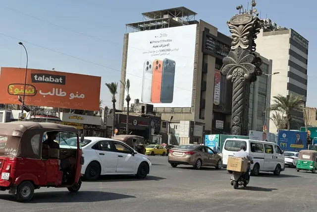 Apple/iPhone billboard at Palestine Street, Baghdad